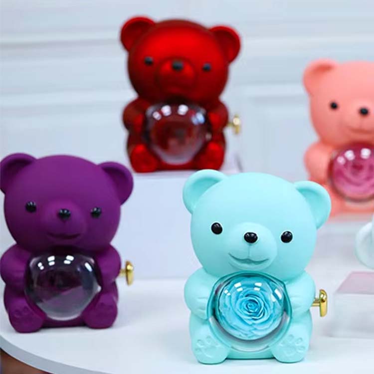 Ours câlin surprise à fleurs préservées